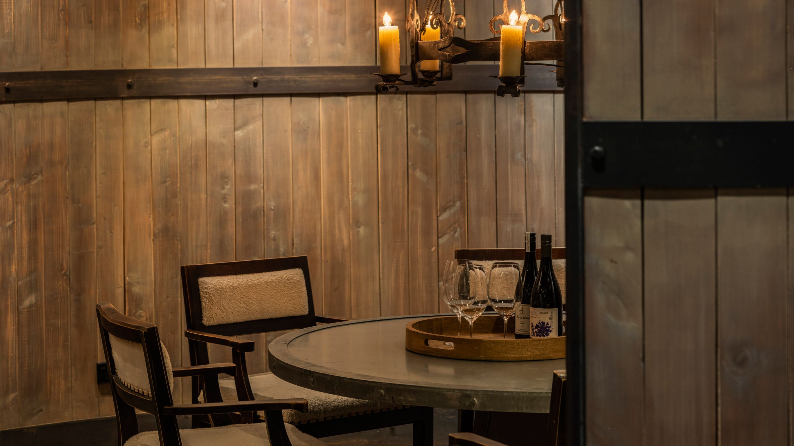 Lower grain silo in the wine cellar with table and chairs